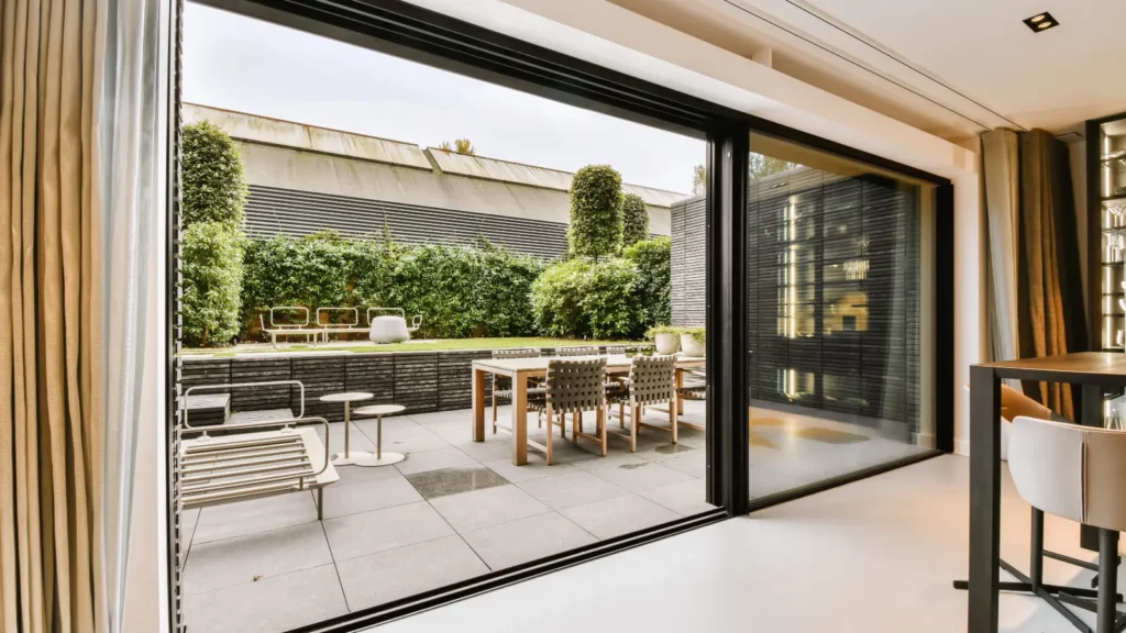 A living room with a large sliding glass door