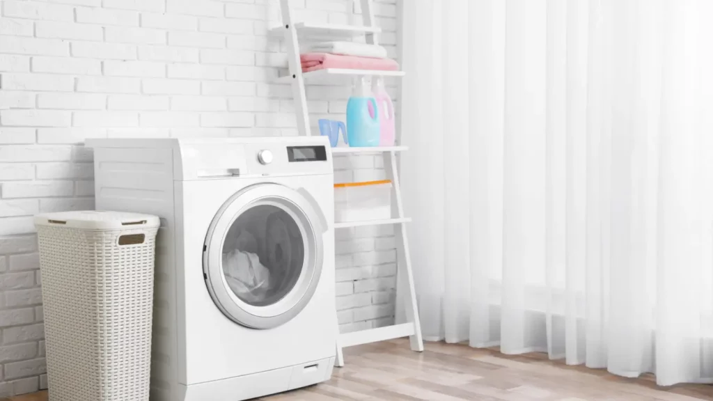 A laundry room with white curtains