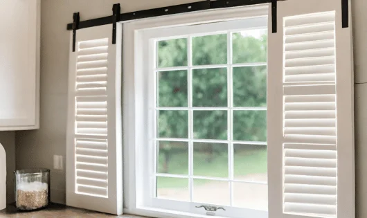 Barn door shutters can add charm to a kitchen.