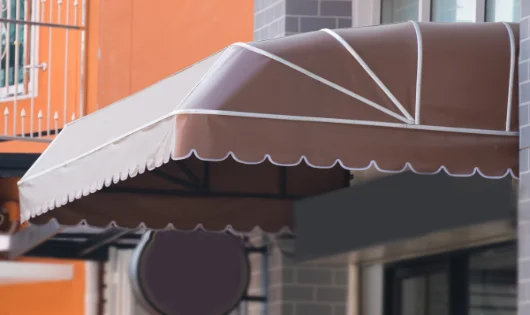 A dome awning over the entrance of a building.