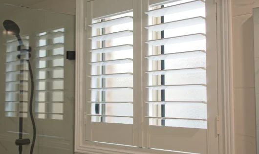 White plantation shutters with their wide slats.