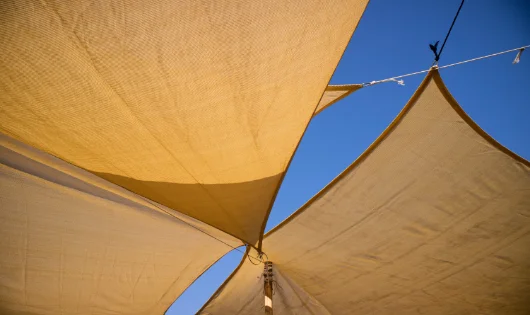 Shade sails arranged in a cloverleaf pattern.
