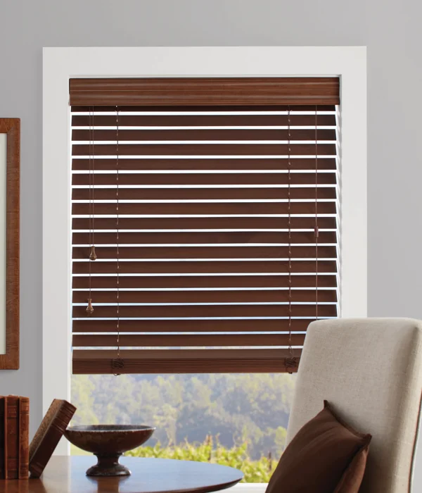 Wooden blinds covering a narrow window.