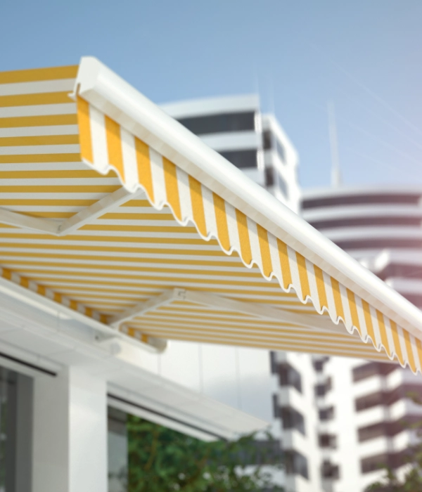 A yellow and white striped retractable awning.