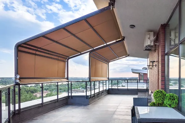 A balcony with a retractable awning.