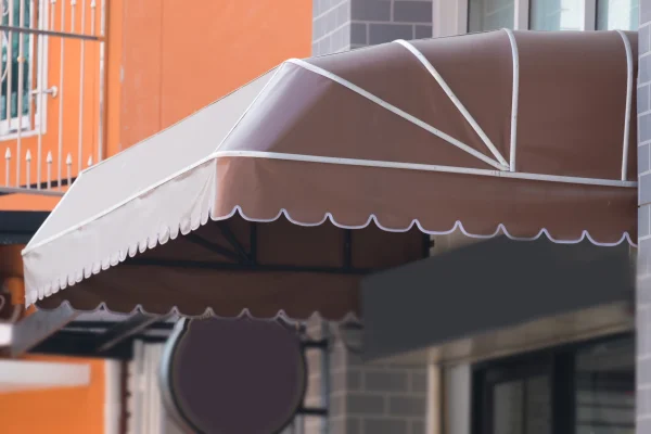 A gray dome awning over a storefront.