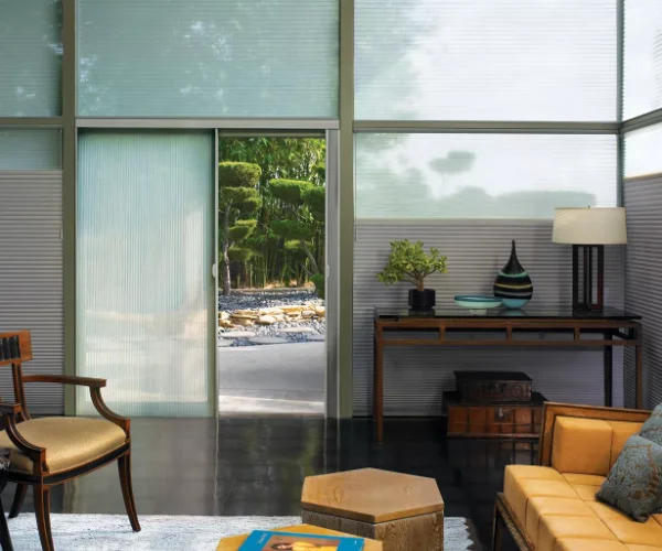 Top down/bottom up cellular shades in a living area.