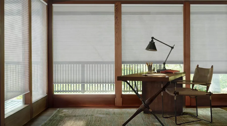 Cellular shades in a home office.