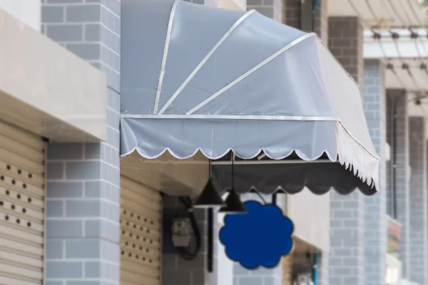 A dome awning on the side of a building.