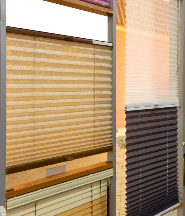 Top down/bottom up pleated shades in a showroom.