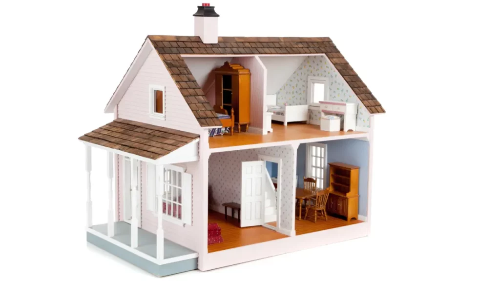 A dollhouse with a kitchen, living room, and bedrooms.