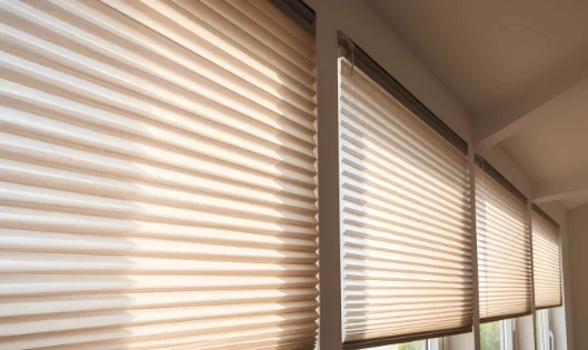 pleated shades blocking sunlight on big windows 